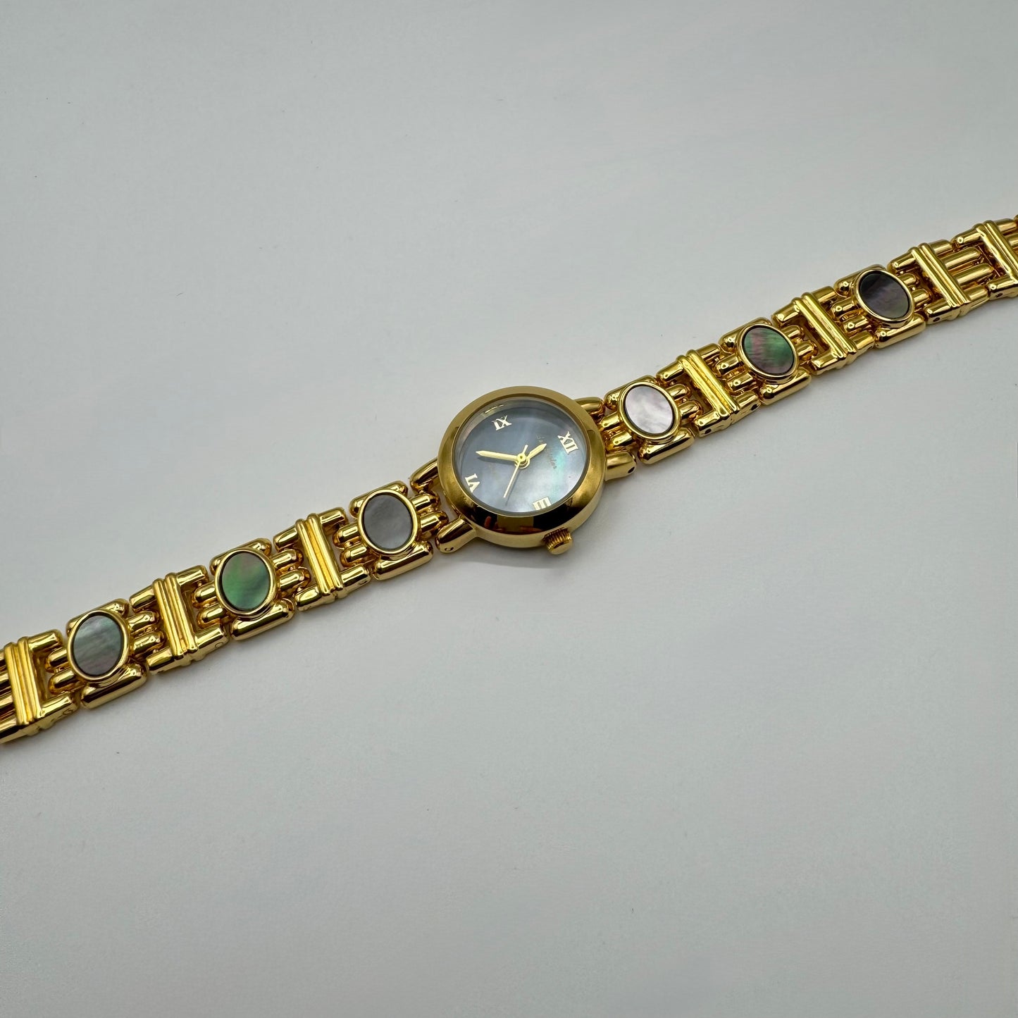 Gold bracelet watch with gemstone accents - Blue pearl dial - Vintage styled gold watch 