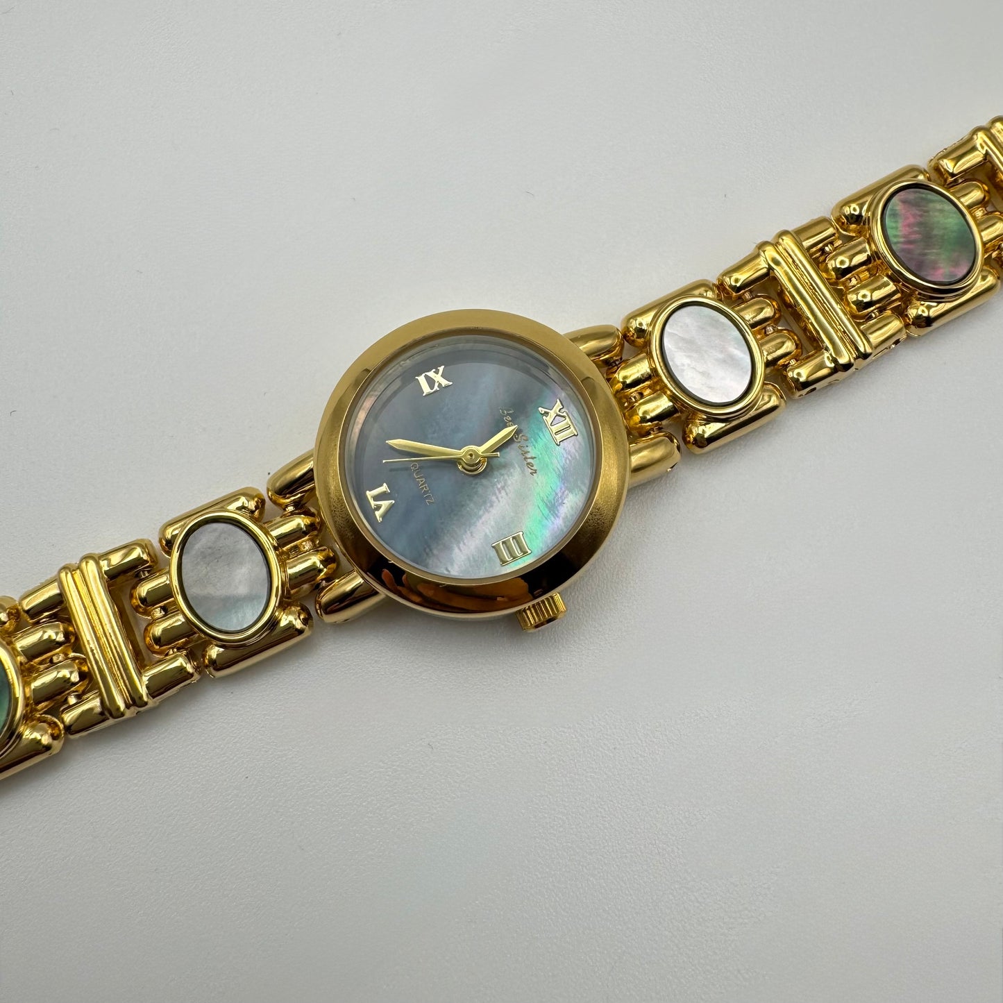 Gold bracelet watch with gemstone accents - Blue pearl dial - Vintage styled gold watch 